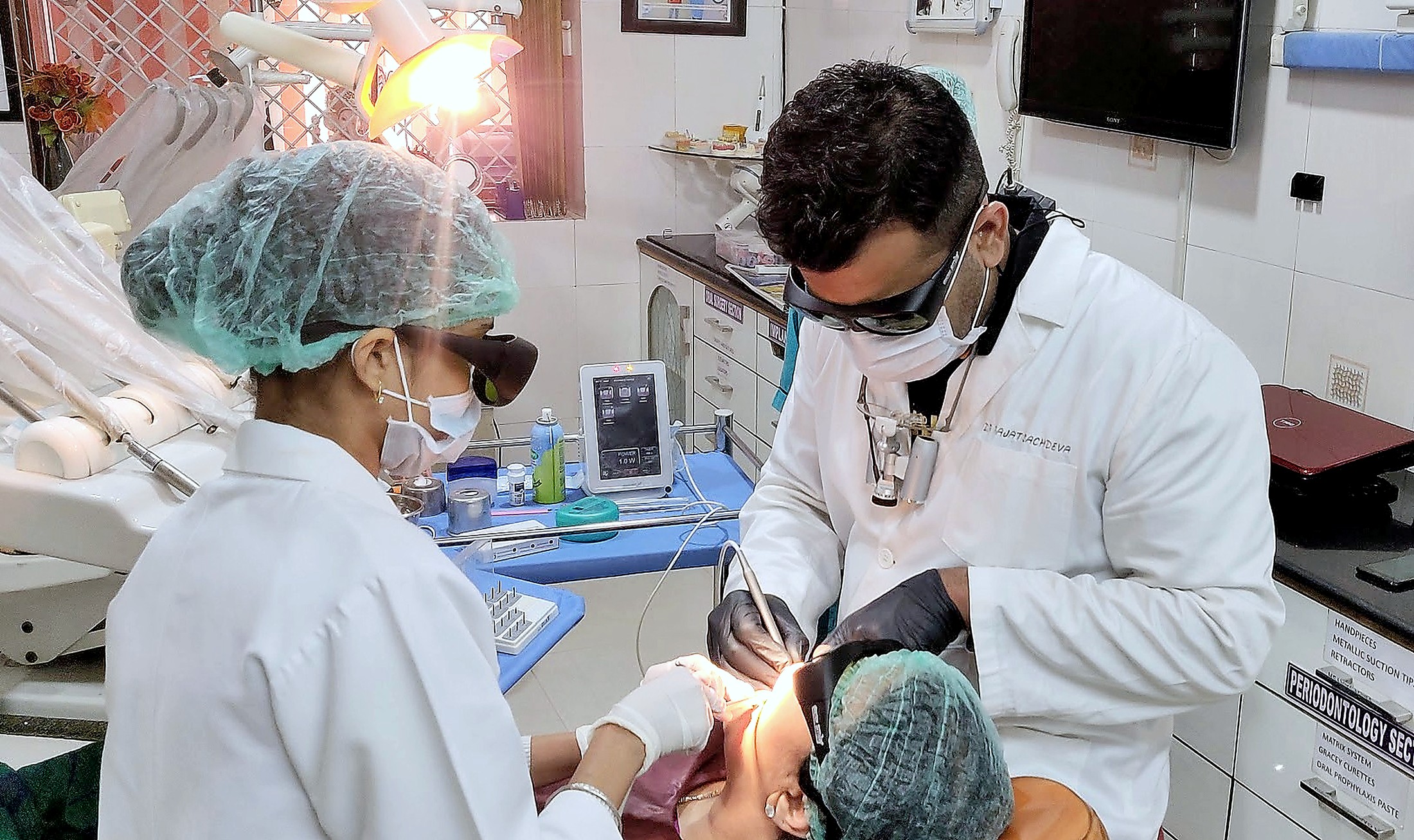 Dr. Rajat Sachdeva performing implant surgery at his Delhi clinic